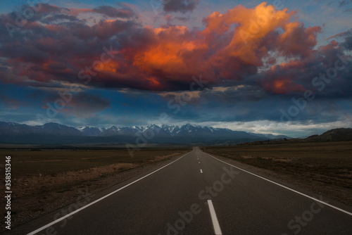 Empty route in Altai mountains with beauty sunset