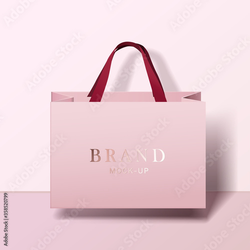 Shopping bag mockup. pink blank paper bags. shopping product package for corporate brand template. photo