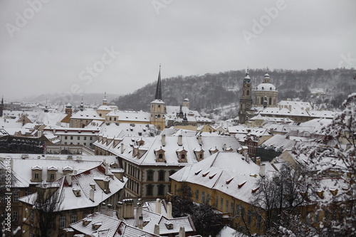Prague in winter, rooftops covered with snow