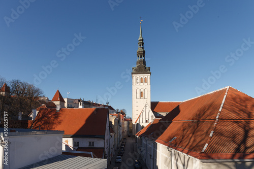 Niguliste church. Colourful red roofs and towers of old town of Tallinn, Estonia