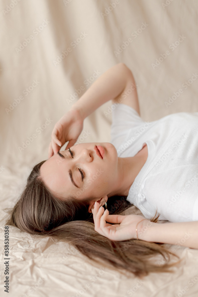 Portrait of a young woman relaxing at home Portrait of a young woman relaxing at home