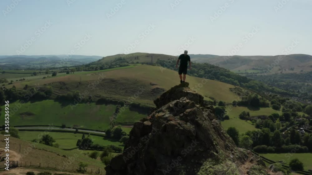 Aerial view of a man climbing in the Shropshire Hills UK