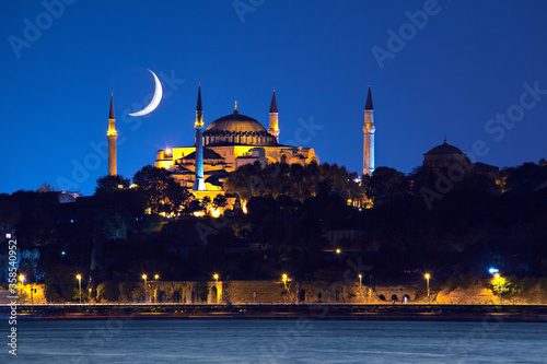 Obraz na płótnie Hagia Sophia at night with crescent moon in the sky, Istanbul, Turkey