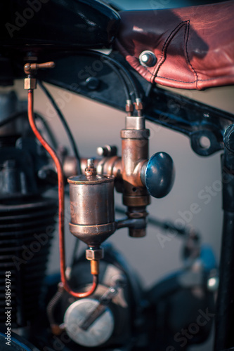 Old Motorcycle's Carburetor detail photo