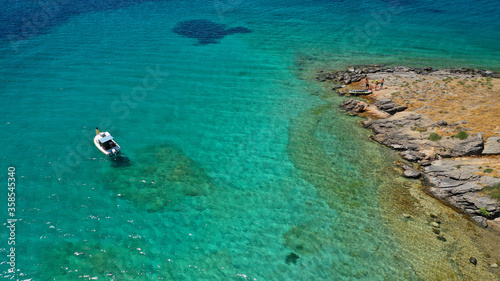 Aerial drone photo of tropical Caribbean bay with white sand beach and beautiful turquoise and sapphire clear sea