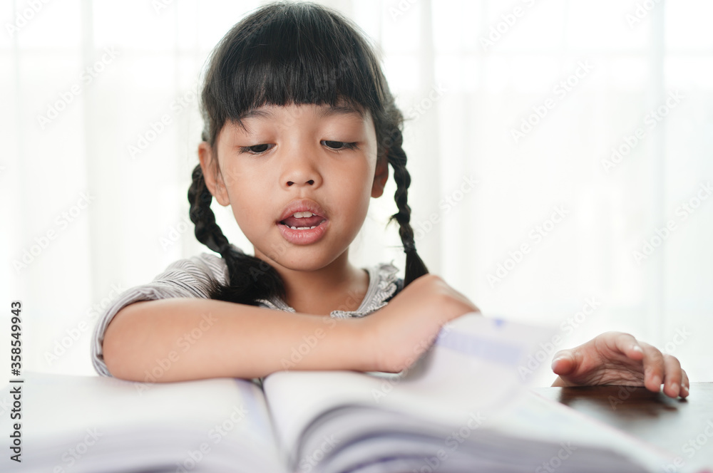 kid reading the book. School children love to read and education concept. kid reading the book. School children love to read and education concept.