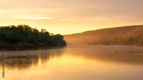 .sunset warm light on the river Seversky Donets, Rostov Region © NadinD