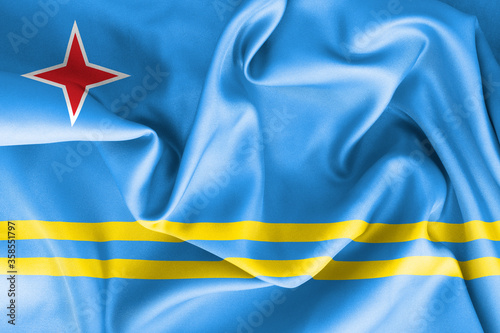 Aruba flag texture creased and crumpled up with light and shadows