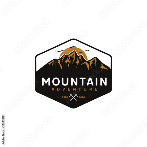 Mountain, outdoor, adventure retro badge logo with the sun photo