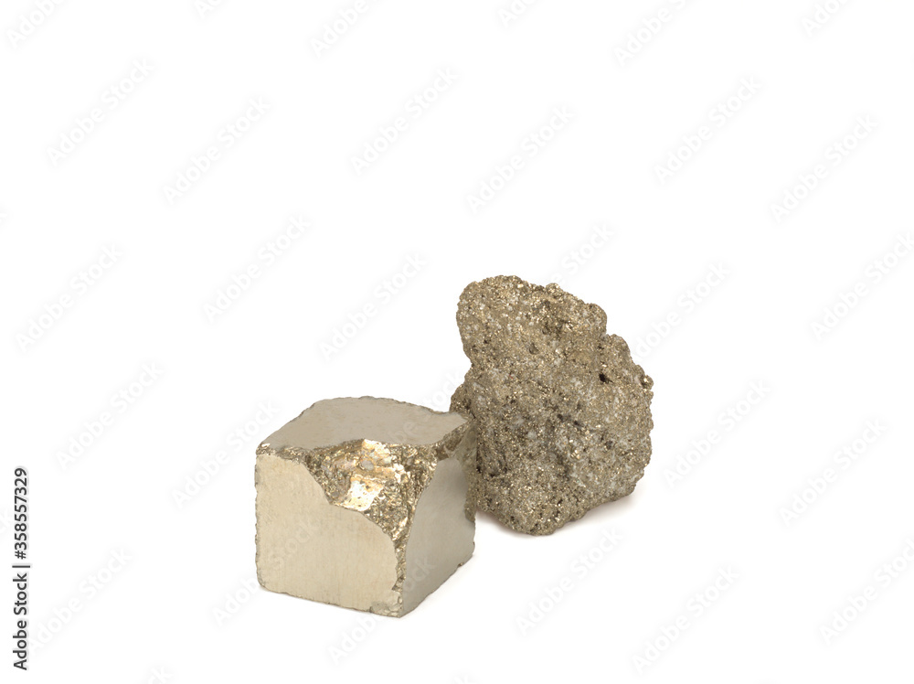 Natural Pyrite and partially treated pyrite on white background. Close-up