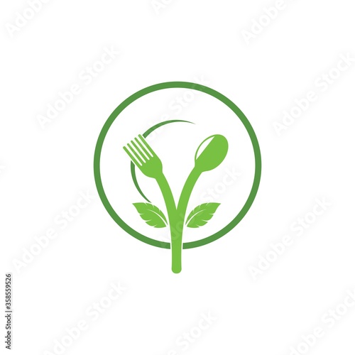 fork and spoon with leaves icon of vegetarian food vector