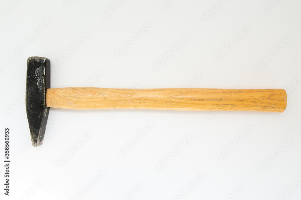 hammer with wooden handle on a white background