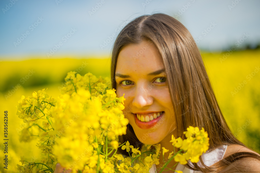 country girl in a good mood walks in a rape field country girl in a good mood walks in a rape field