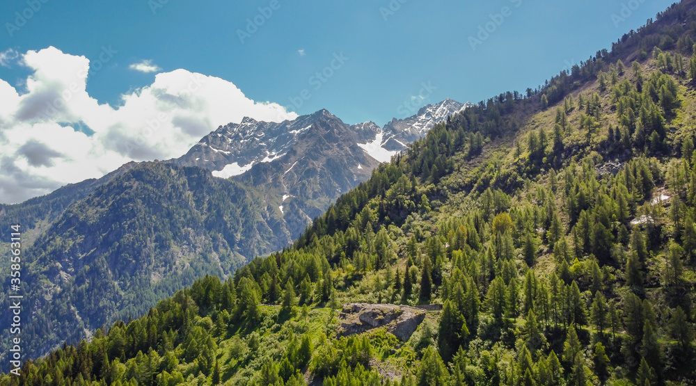 Fototapeta premium Aerial view mountains of Valle di Sole, Vermiglio in Trentino Alto Adige, northern Italy, Europe - Trento Province