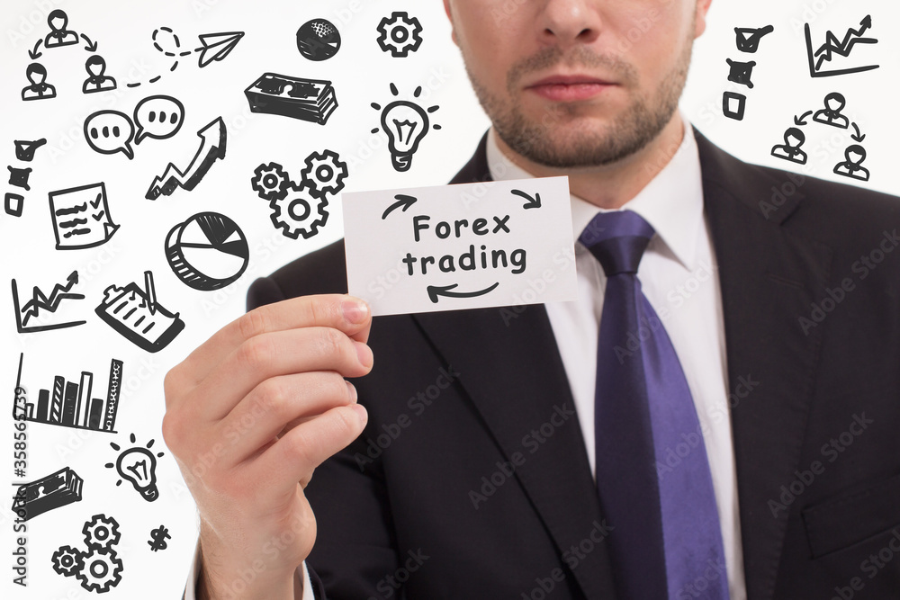 Business, technology, internet and network concept. Young businessman thinks over the steps for successful growth: Forex trading Business, technology, internet and network concept. Young businessman thinks over the steps for successful growth: Forex trading