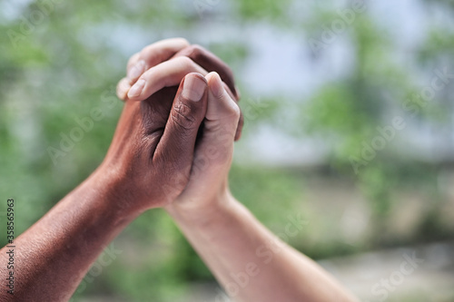 Black And White Hands Holding Each Other