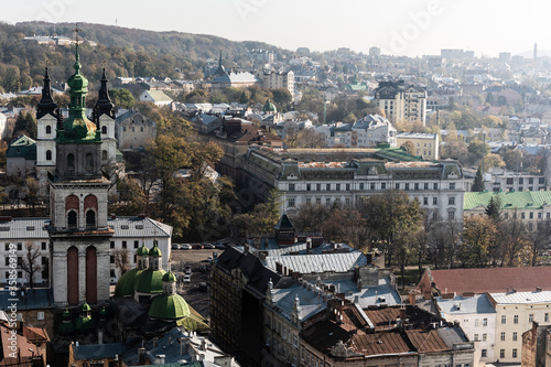 aerial view of lviv city with carmelite church and buildings in downtown of lviv, ukraine