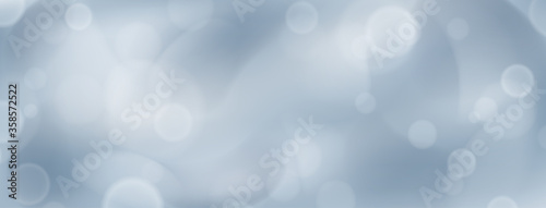Abstract background with bokeh effects in gray colors