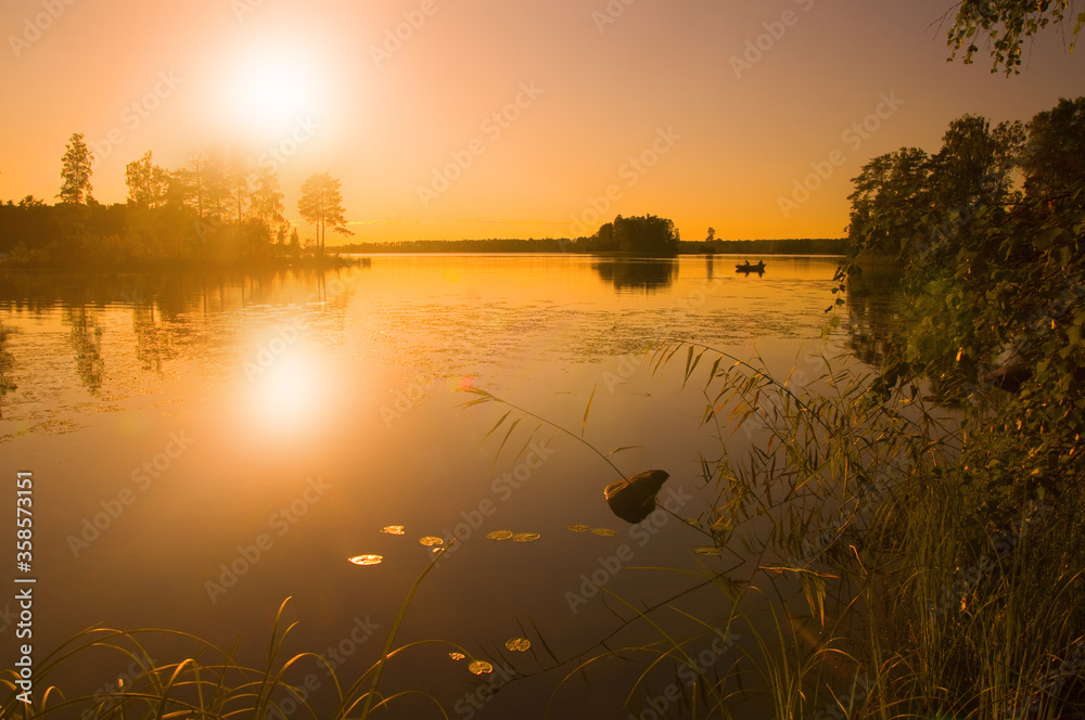 Calm summer evening on the lake.