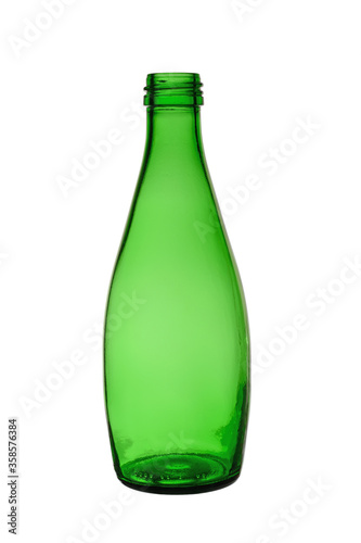 Empty green transparent glass bottle for liquids. Isolated on a white background without a cover