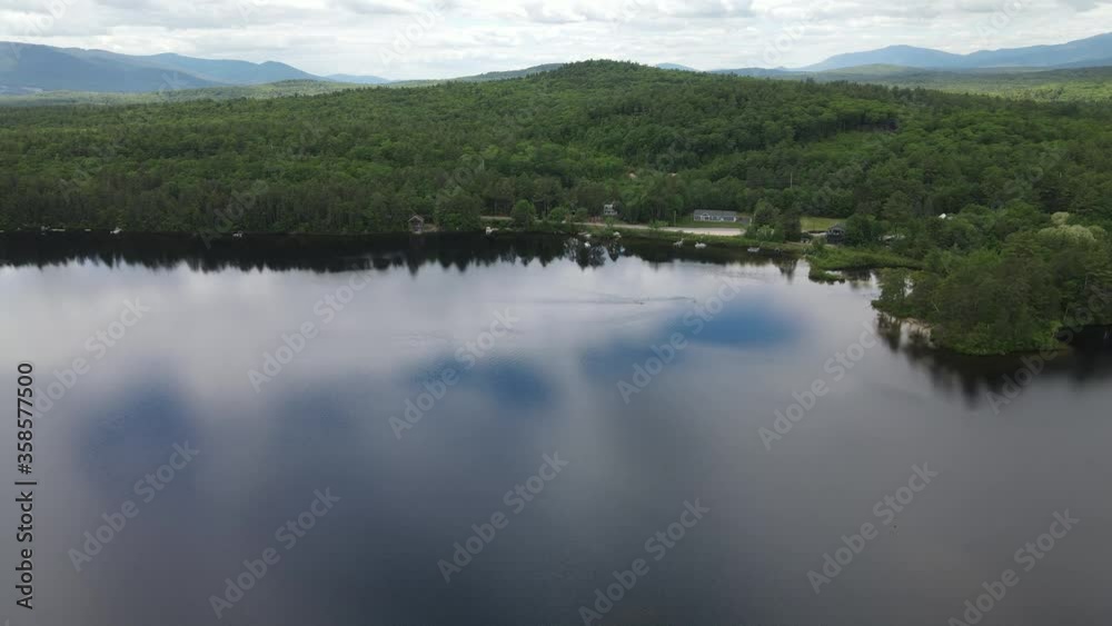 Mountains Trees Grass Lake New Hampshire Drone Aerial Flyover 4K Footage Fast Slow Clouds Blue Sky Water Fish Boats Canoe Mountian Tree Mountains Trees Grass Lake New Hampshire Drone Aerial Flyover 4K Footage Fast Slow Clouds Blue Sky Water Fish Boats Canoe Mountian Tree