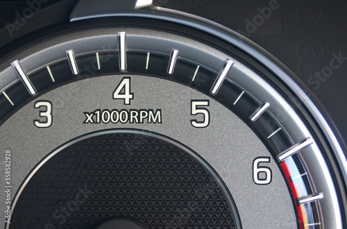 Close-up of vehicle tachometer photo