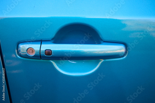 Blue car door handle