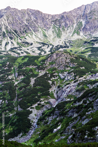 Big Siklawa waterfall in Tatra Mountains - Poland, Europe. photo