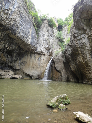 Fototapeta Naklejka Na Ścianę i Meble -  Small waterfall in the mountains