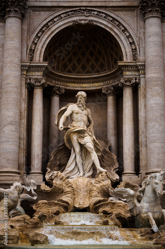 Close up on the god Neptune in the Trevi Fountain in Rome