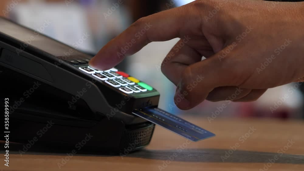 Customer using credit card for payment, credit card payment service.