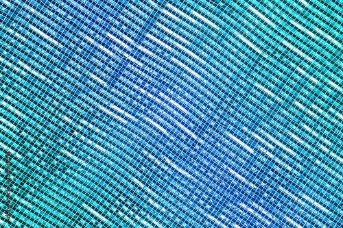 Blue, green and white sparkle ribbon weave textured background