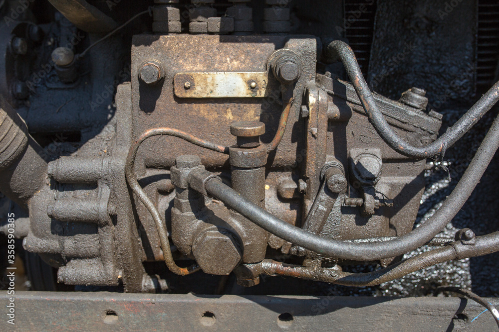 old engine in oil and dirt close up