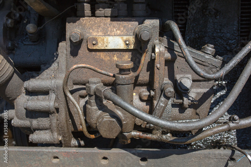 old engine in oil and dirt close up