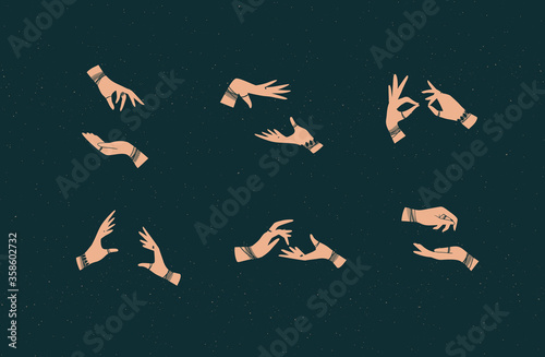 Hands pair with bracelets and rings in ethnical style in different positions to express emotions drawing on dark background