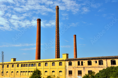 smokestacks of an abandoned pasta factory in Imperia Italy