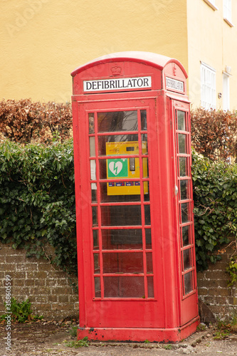 old telephone box now reused as a defibrillator station