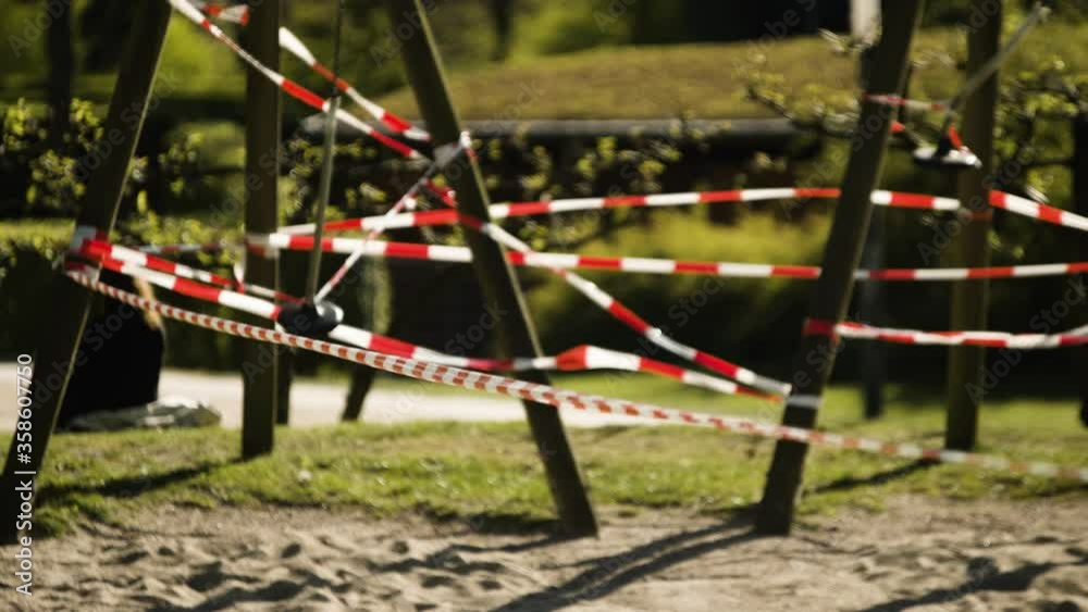 Barricade Tape Blocking Entrance to Swings Barricade Tape Blocking Entrance to Swings
