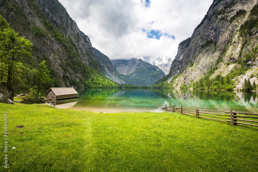 Scenic Lake Obersee with old boat house in summer, Bavaria, Germany