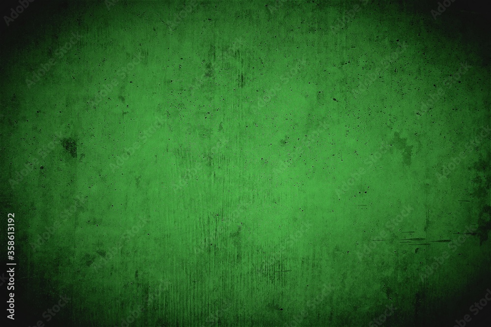 Fototapeta premium Dirty creepy basement wall in green with dark vignette.