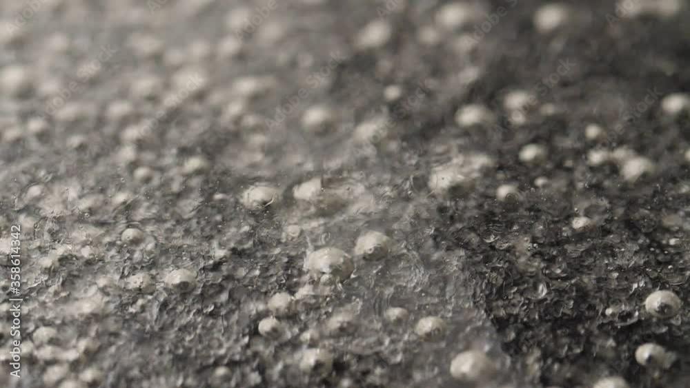 Slow motion shot of bubbles in thick boiling liquid. Slow motion shot of bubbles in thick boiling liquid.