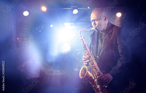 Man Playing Saxophone on Stage