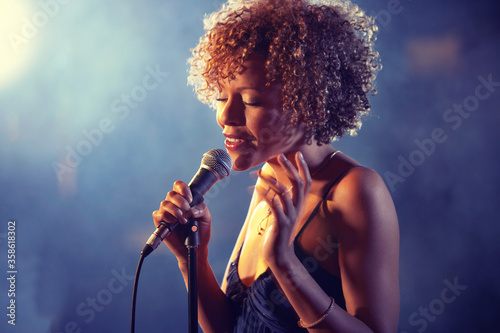 Fotografie, Obraz Black female Singer Performing on stage