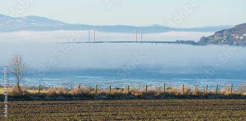 The Kessock Bridge trapped in low cloud by a temperature inversion
