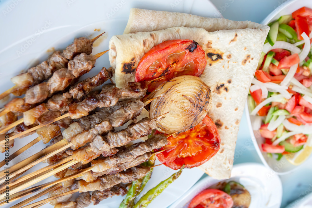 Traditional delicious Turkish foods; skewers cop sis Traditional delicious Turkish foods; skewers cop sis