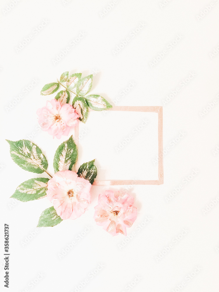 Square floral  design frame. Pink pastel  rose, white roses  flowers, eucalyptus, forest fern, greenery. Wedding elegant card .Isolated on white background