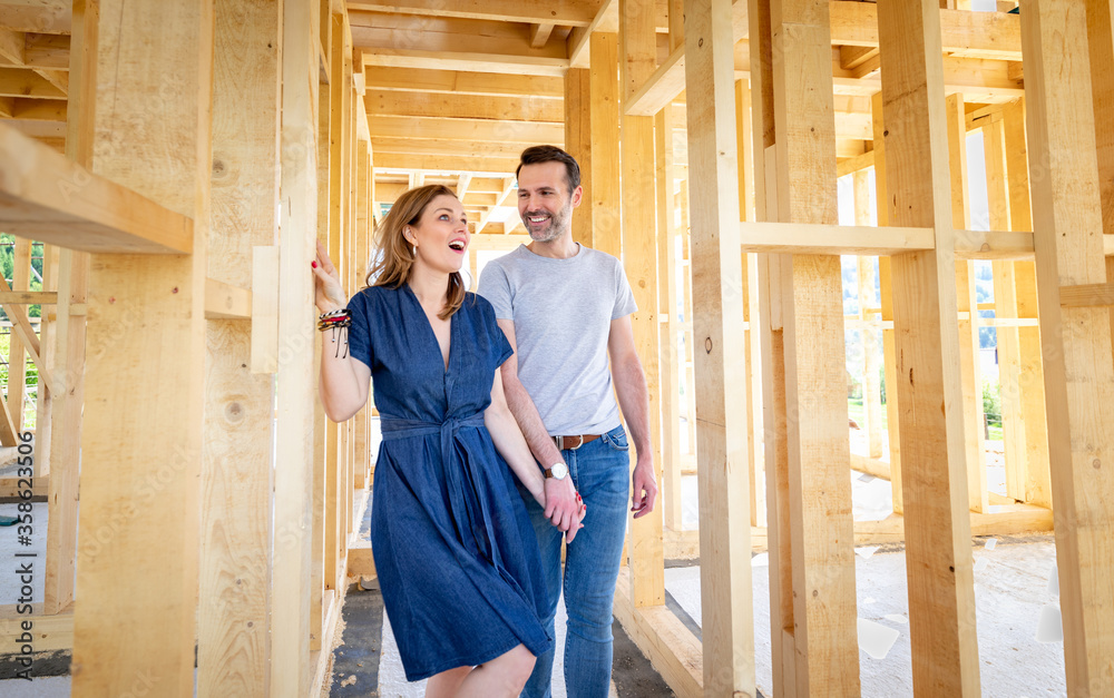 Couple make their dreams of building their own home come true visiting house under construction Couple make their dreams of building their own home come true visiting house under construction