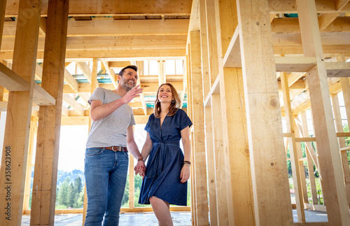 Couple make their dreams of building their own home come true visiting house under construction photo