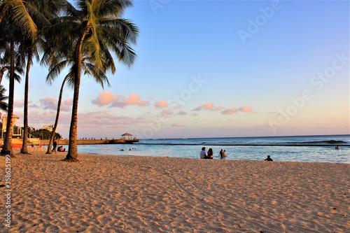 tropical beach at sunset waikiki Hawaii © Jay V