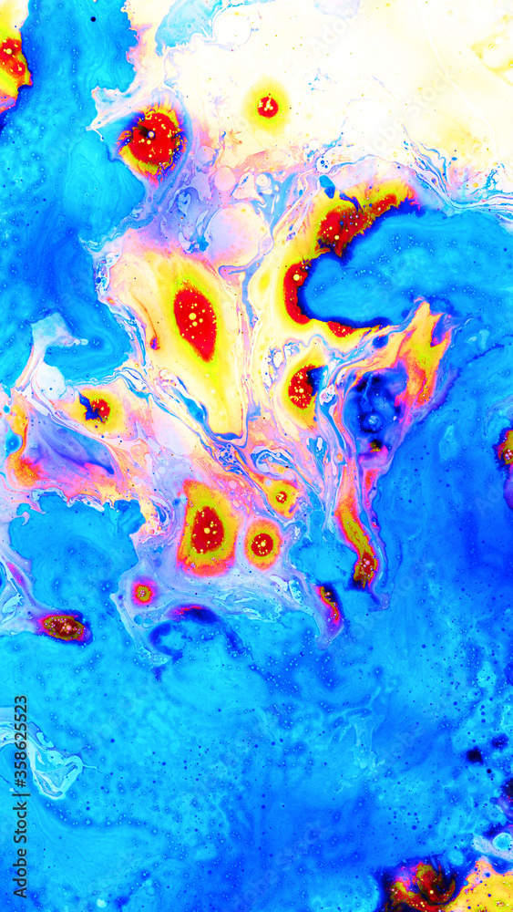 Fototapeta premium Abstract background of colored liquid, top shot, close-up.